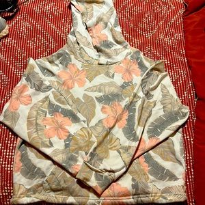 Rip Curl pull over crop sweater with draw string.